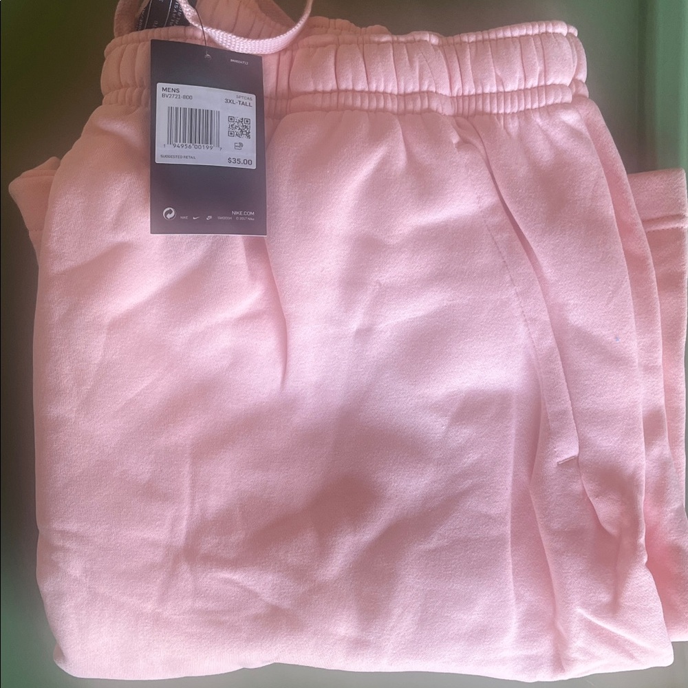 Nike Phone Accessory Tag in Light Pink